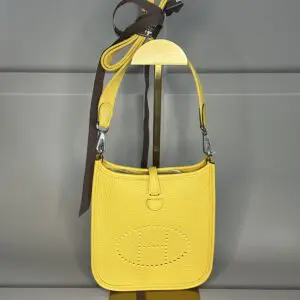 A yellow bag hanging on the wall